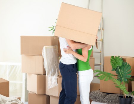 Office relocation and removal team handling business equipment