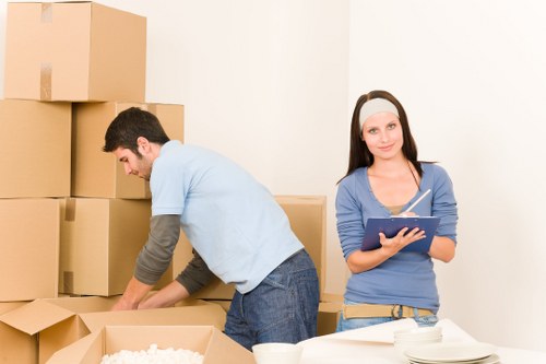 Staff reviewing a storage-related complaint with documents